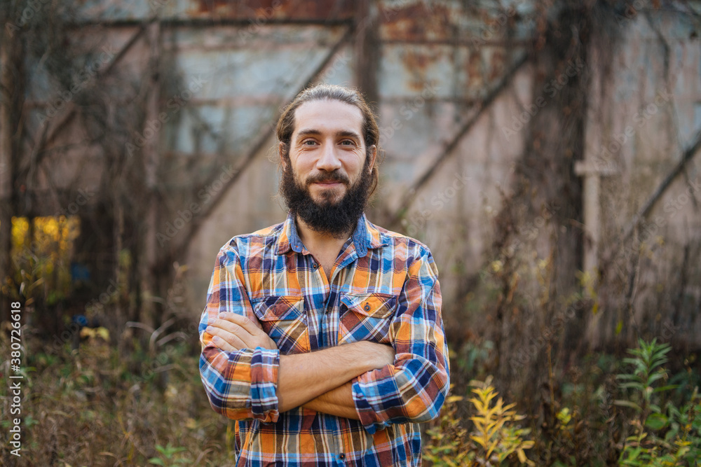 portrait of a bearded man in a plaid shirt portrait of a bearded man in a plaid shirt