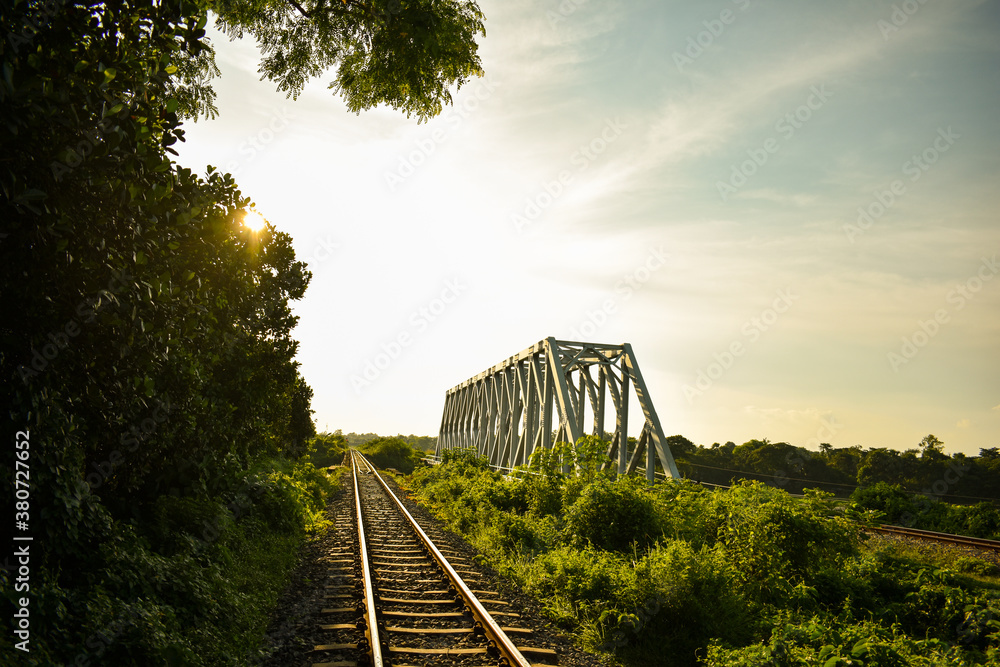 the rail line and Railway Bridge passes through a green environment day scenery the rail line and Railway Bridge passes through a green environment day scenery