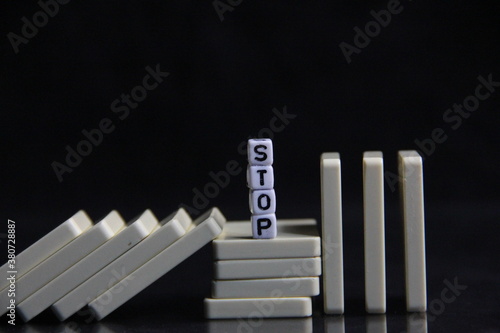 white dominoes and risk