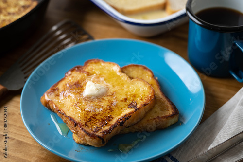 cooking french toast with iron skillet pan