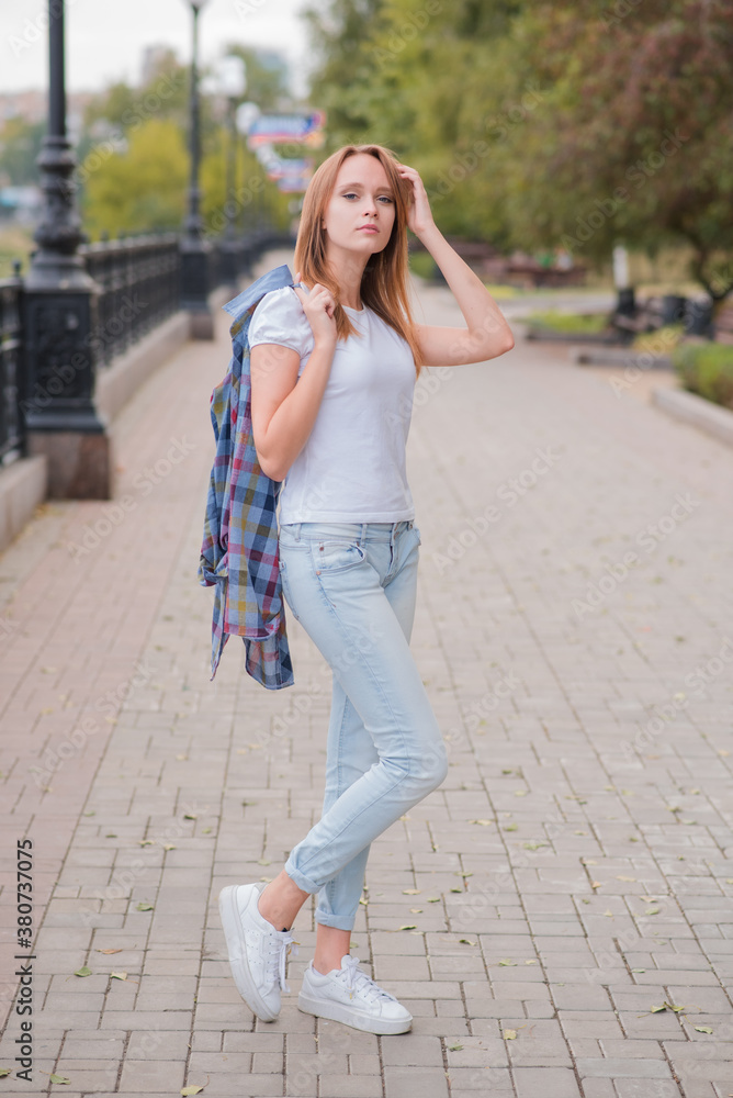 Portrait of a beautiful and happy girl outdoors Portrait of a beautiful and happy girl outdoors