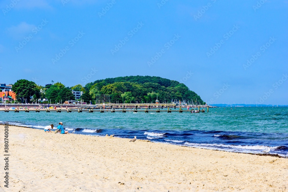 Beach in Lubeck - Travemunde (Travemünde) on baltic sea. Schleswig-Holstein, Germany. Beach in Lubeck - Travemunde (Travemünde) on baltic sea. Schleswig-Holstein, Germany.