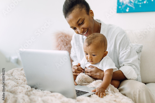 Working mother with a baby photo