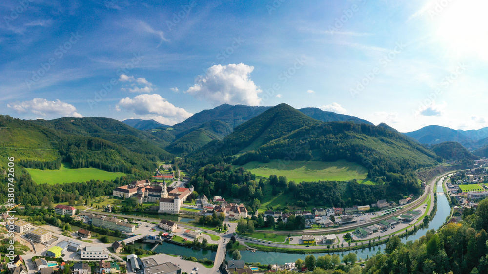 Lilienfeld in Lower Austria. Aerial view to the abbey monastery and the Traisen river and the Muckenkogel mountain