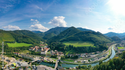 Lilienfeld in Lower Austria. Aerial view to the abbey monastery and the Traisen river and the Muckenkogel mountain photo