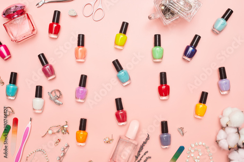 concept, manicure with nail polish, pedicure on pink background, copy space, Flat Lay