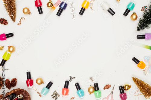 christmas concept, new year, manicure with nail polish, pedicure on white background, copy space, Flat Lay