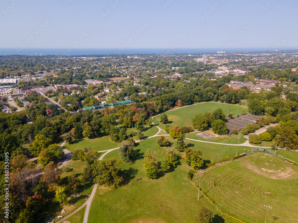 Aerial view of park and trees starting to change color