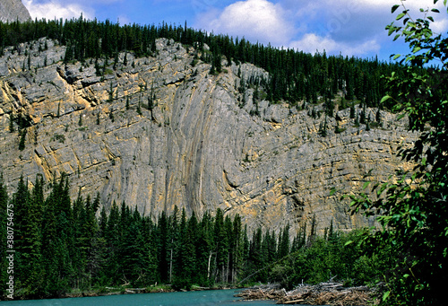 Folded Paleozoic sedimentary strata of the Sentinel Range, British Columbia, Muncho Lake, Canada  photo