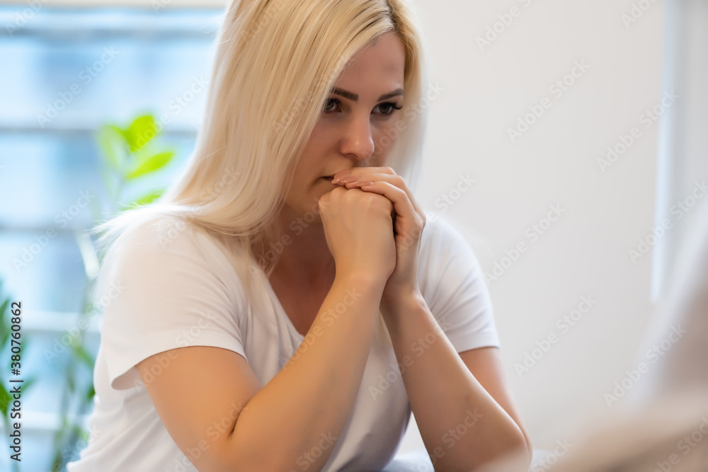 Closeup portrait of a young caucasian woman praying Closeup portrait of a young caucasian woman praying