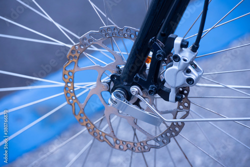 Close up of bike brake rotor and assembly