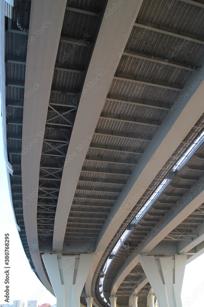 large car overpass with large supports in the evening in autumn