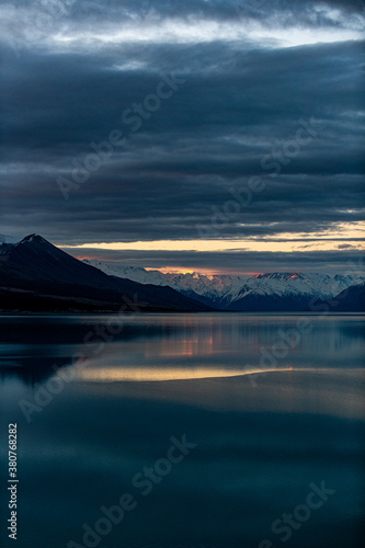 sunset over a lake with mountains in New Zealand © Ingmar