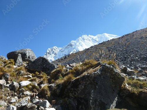 Scenic view of the rocky and mountainous terrain, including snow capped peaks, along the Salkantay trek in Peru