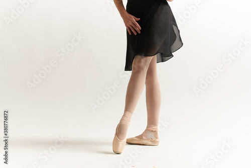 Ballerina's legs correct positioning of legs movement exercise tutu pointe shoes model