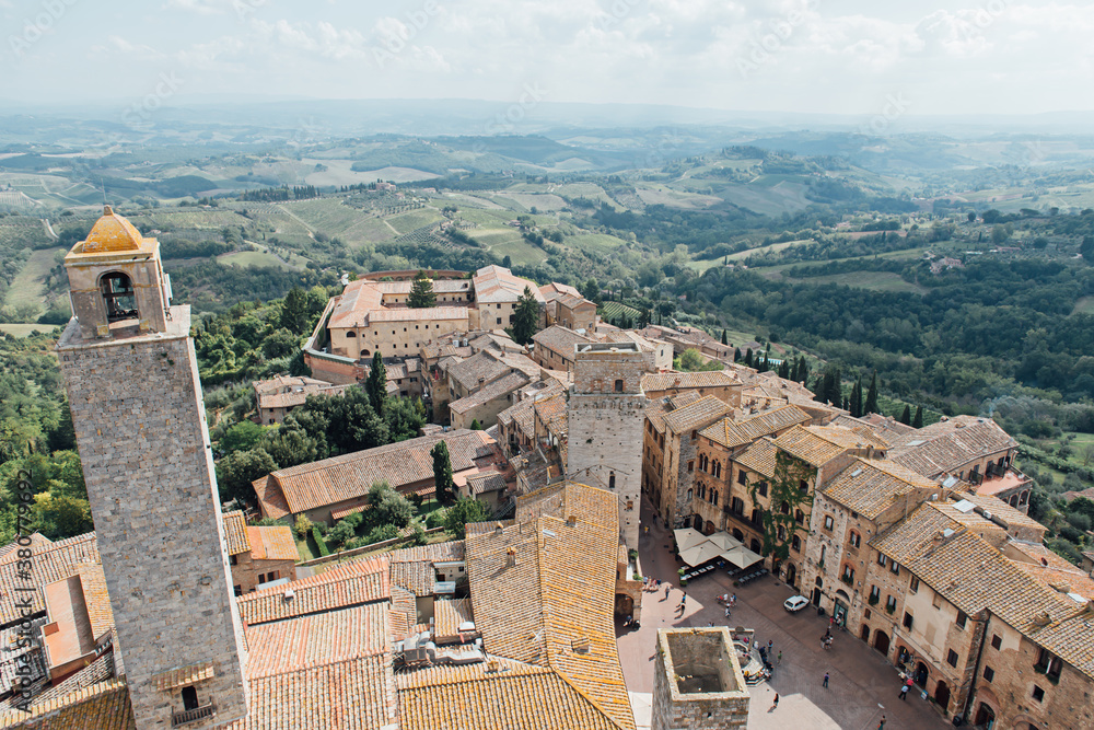 San Gimignano rooftops and Tuscany countryside San Gimignano rooftops and Tuscany countryside
