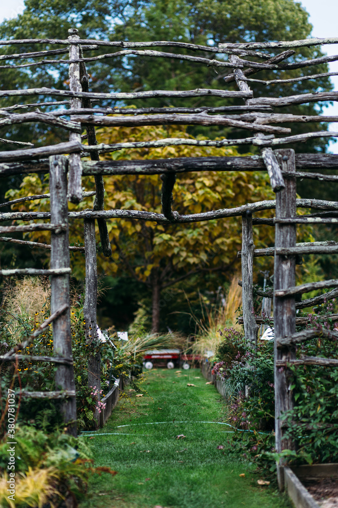 Wood terrace leading a path in a flower garden Wood terrace leading a path in a flower garden
