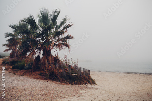 Empty beach on a foggy day in Six Fours les Plages (Provence, France) photo