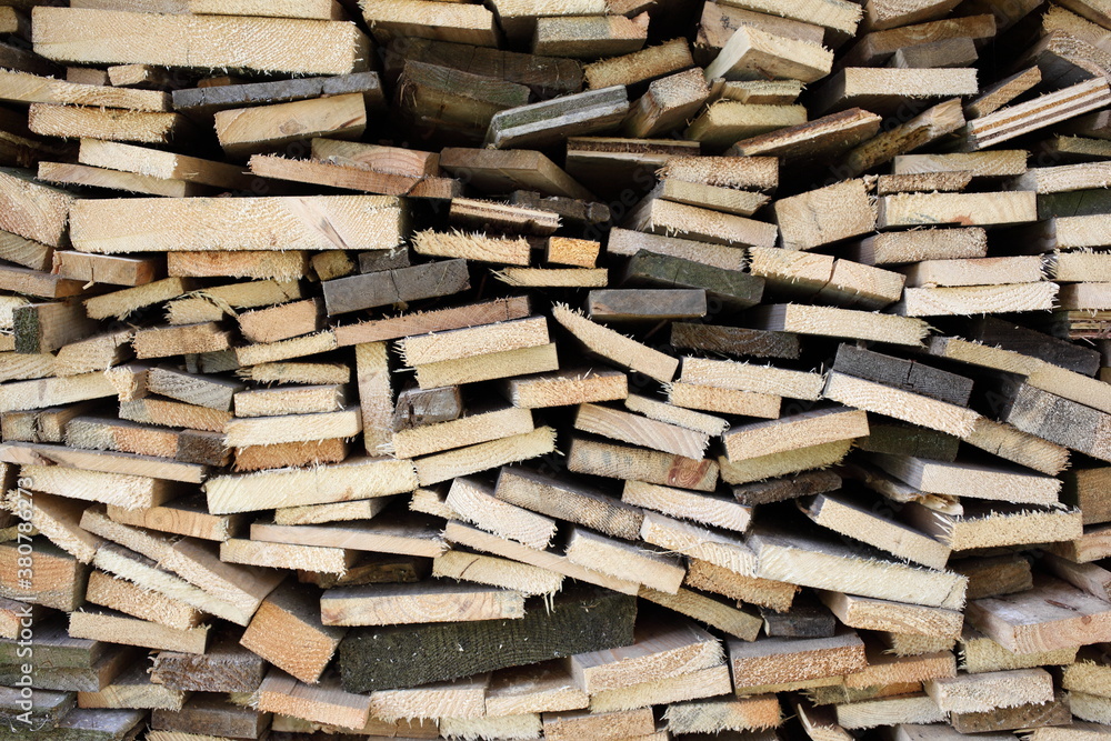 Old planks cut to pieces and strored away as firewood for the winter Old planks cut to pieces and strored away as firewood for the winter
