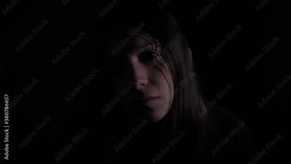Medium shot young woman, black background, copy space, social media, mental health campaign, depression, concept emotions, female advertising, anxiety Medium shot young woman, black background, copy space, social media, mental health campaign, depression, concept emotions, female advertising, anxiety