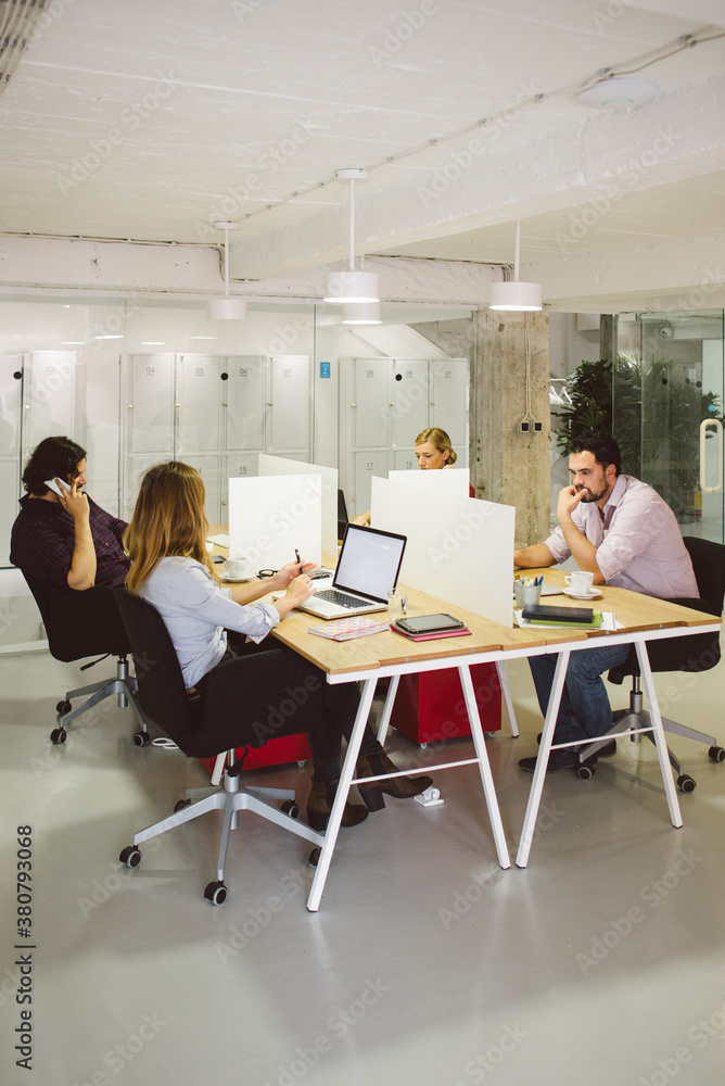 People Working Together At The Office People Working Together At The Office