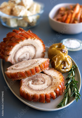 Sliced pork roast with baked apples photo