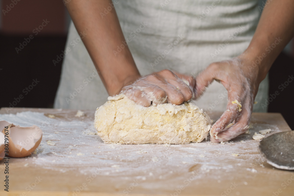 Woman making homemade fresh pasta in the kitchen Woman making homemade fresh pasta in the kitchen