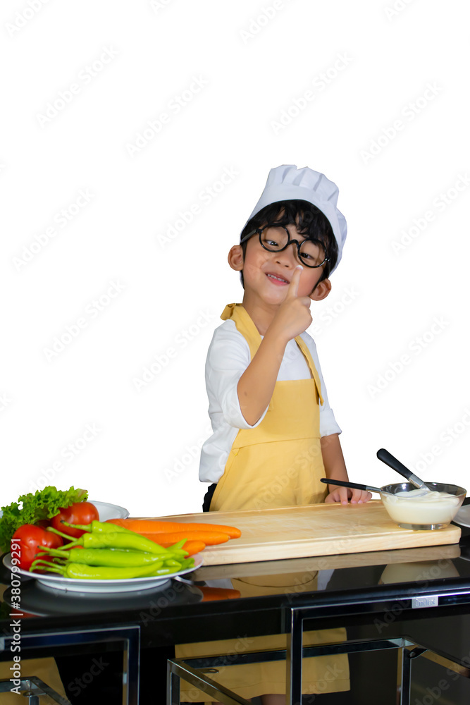 little boy chef cooking and dirty in the kitchen during holiday little boy chef cooking and dirty in the kitchen during holiday