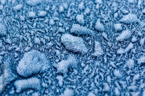 Frosty buildup on a blue surface
