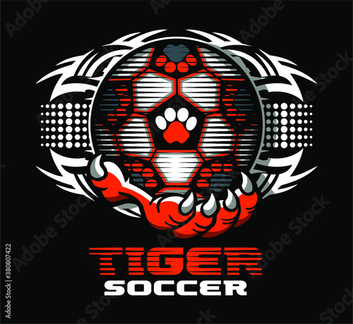 tribal tiger soccer team design with mascot claw holding ball for school, college or league