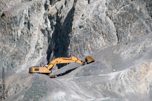 Excavator in a stone quarry