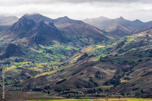 Dramatic high altitude Andes landscape with agriculture fields near Quito, Ecuador.