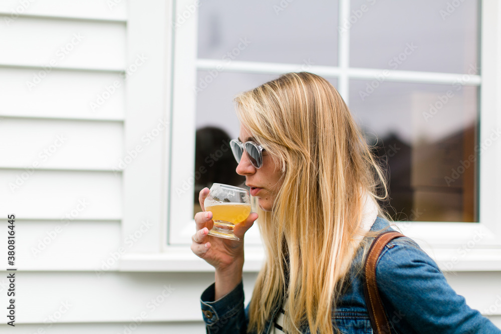 Young woman drinking beer Young woman drinking beer