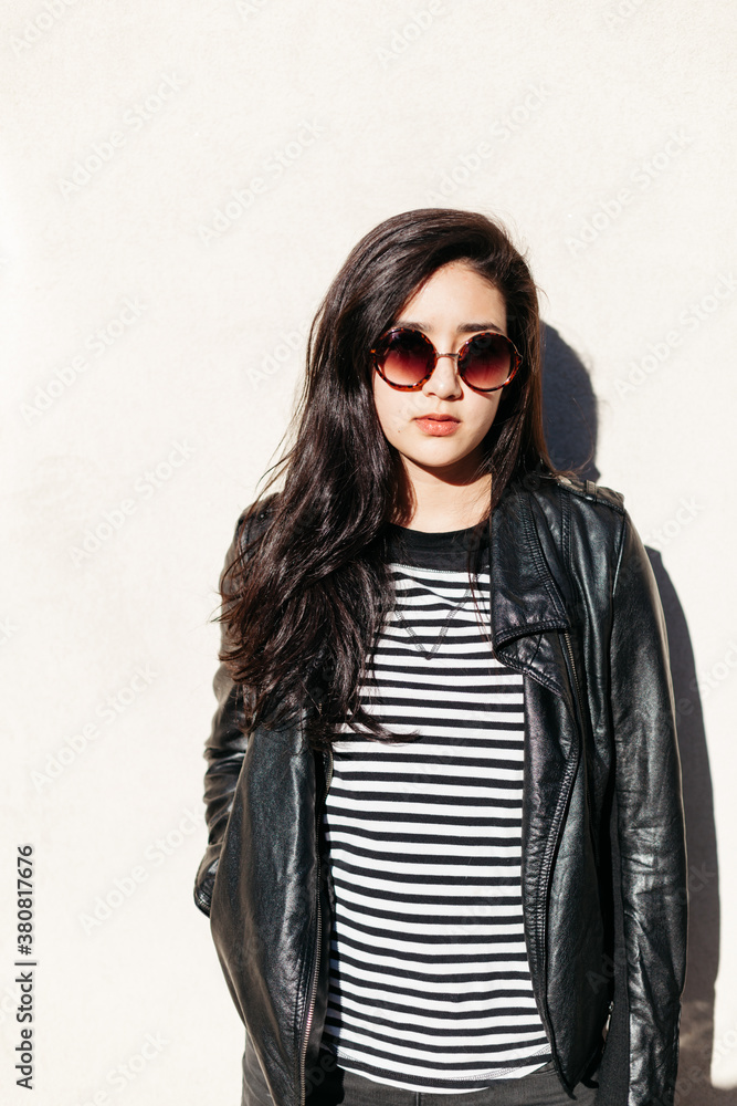 Beautiful woman wearing a black leather jacket Beautiful woman wearing a black leather jacket