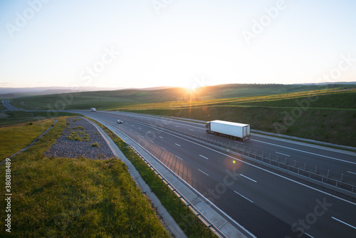 Interstate highway transportation on a summer day during sunset