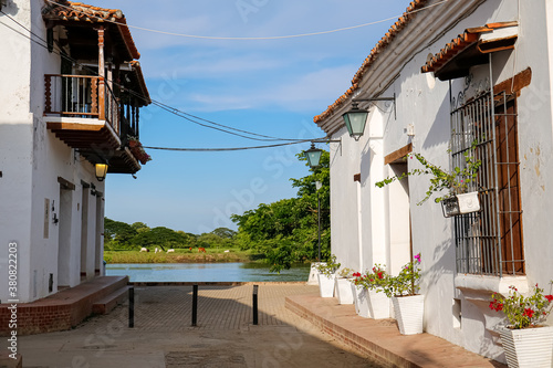 View through typical white one story buildings to the river, Santa Cruz de Mompox, Colombia, World Heritage photo