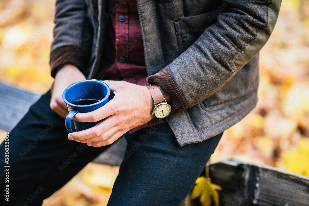 Man's hands holding a coffee cup Man's hands holding a coffee cup