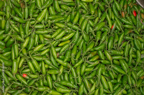 Green peppers chili vegetables stalls in road market Kolkata, India. photo