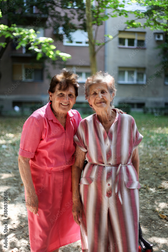 Portrait of two happy senior women outdoors Portrait of two happy senior women outdoors