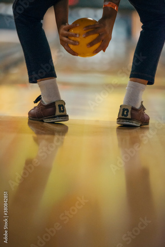 Child Bowling With Two Hands photo