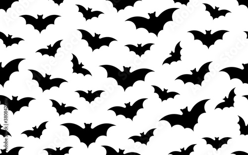 Seamless pattern of Halloween bats flying on white background