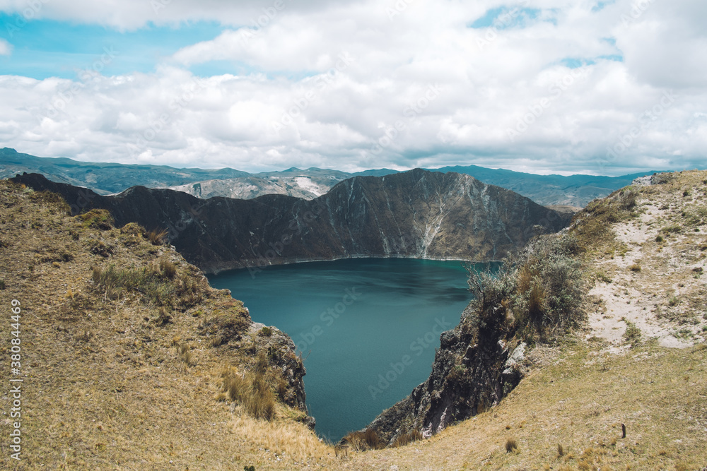 The Crater Lake Peaking through the Ridges of a Volcano The Crater Lake Peaking through the Ridges of a Volcano