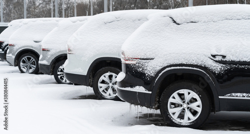 Parked cars covered with snow © scharfsinn86