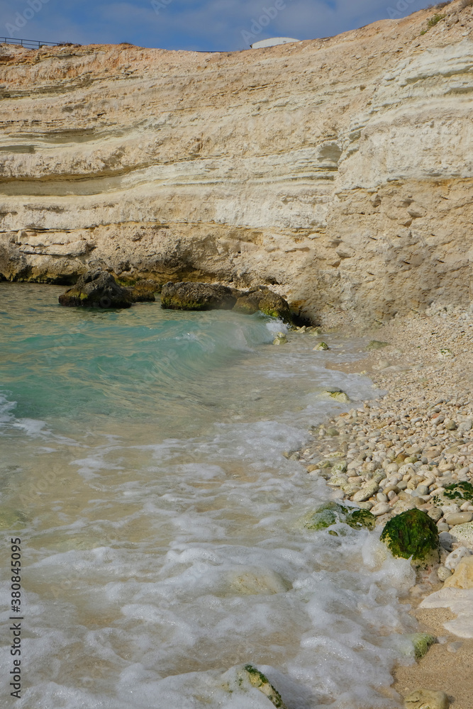 Silky blue sea waves and beautiful rocky coast. Crimea, black sea.
