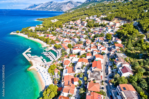 Aerial view of Brela beach and waterfront on Makarska riviera © xbrchx