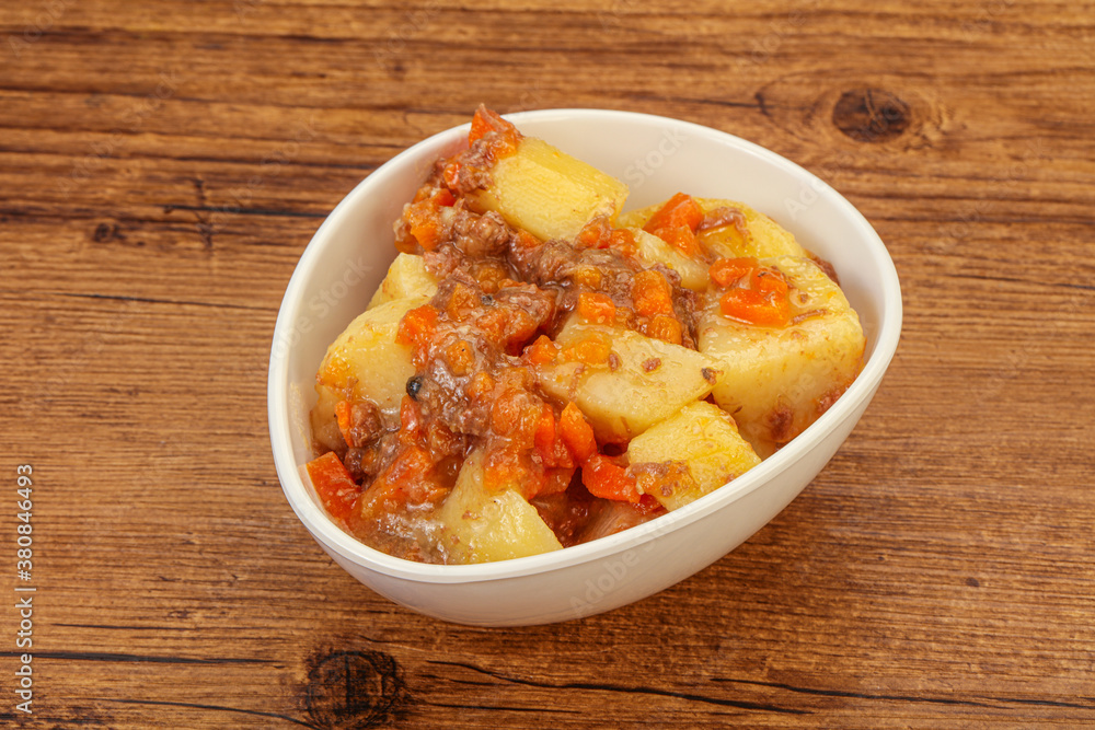 Roasted potato and beef with sauce Roasted potato and beef with sauce