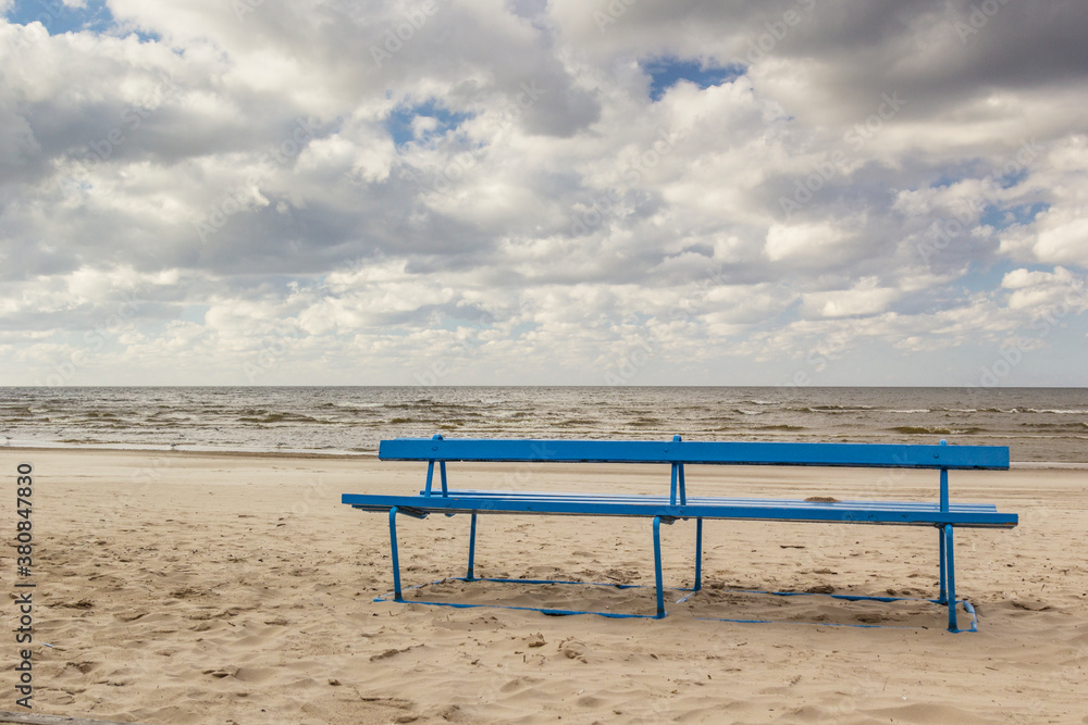 Latvia, Jurmala - Typical Blue Bench at the beach of Jurmala Latvia, Jurmala - Typical Blue Bench at the beach of Jurmala