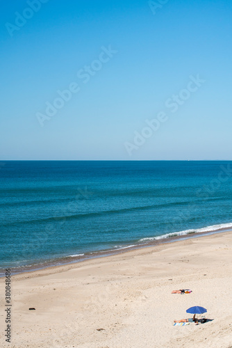 Blue parasol, blue sky photo