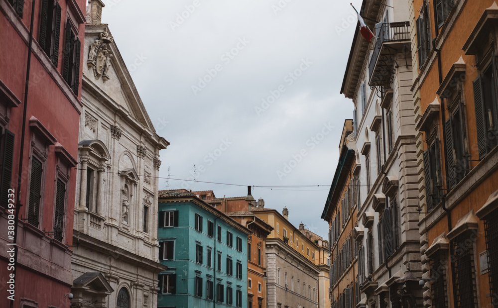 Roman Street with Pastel Houses and Buildings Roman Street with Pastel Houses and Buildings
