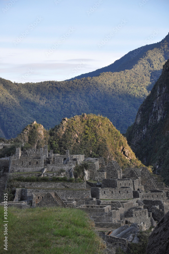 The stone houses and ruins inside the lost city of Machu Picchu, as seen in the early morning light